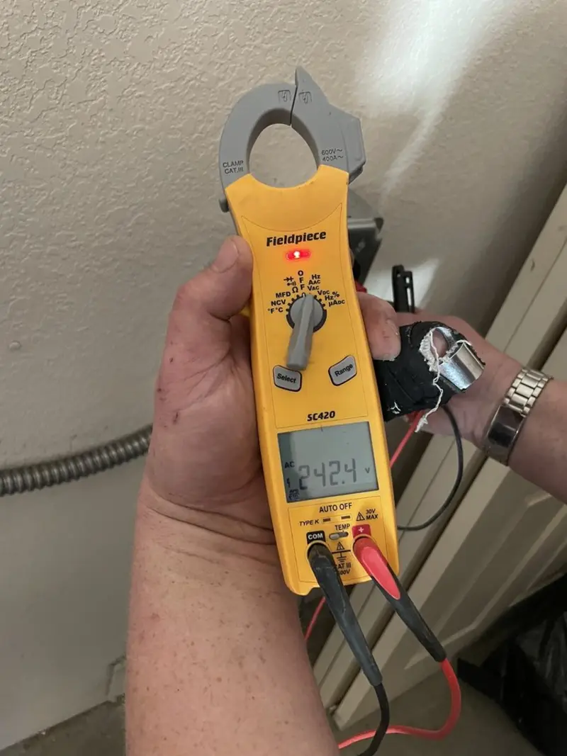 Voltage testing with clamp meter during Generator Installation in Rush City